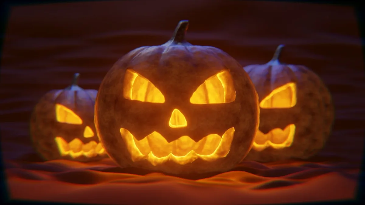 Glowing carved jack-o'-lanterns on Halloween night